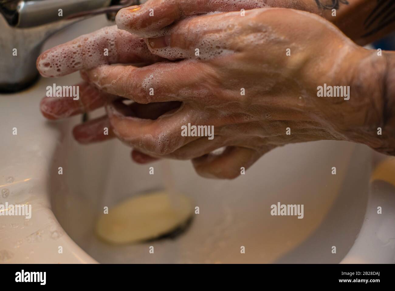 Wash hands with soap, wash hands under running water with soap Stock ...