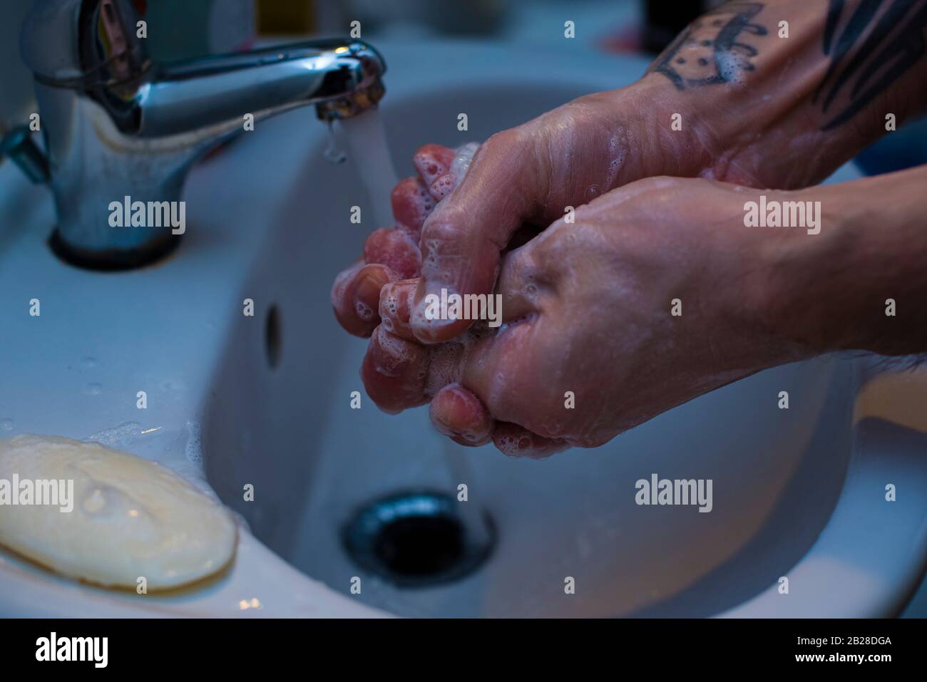 Wash hands with soap, wash hands under running water with soap Stock ...