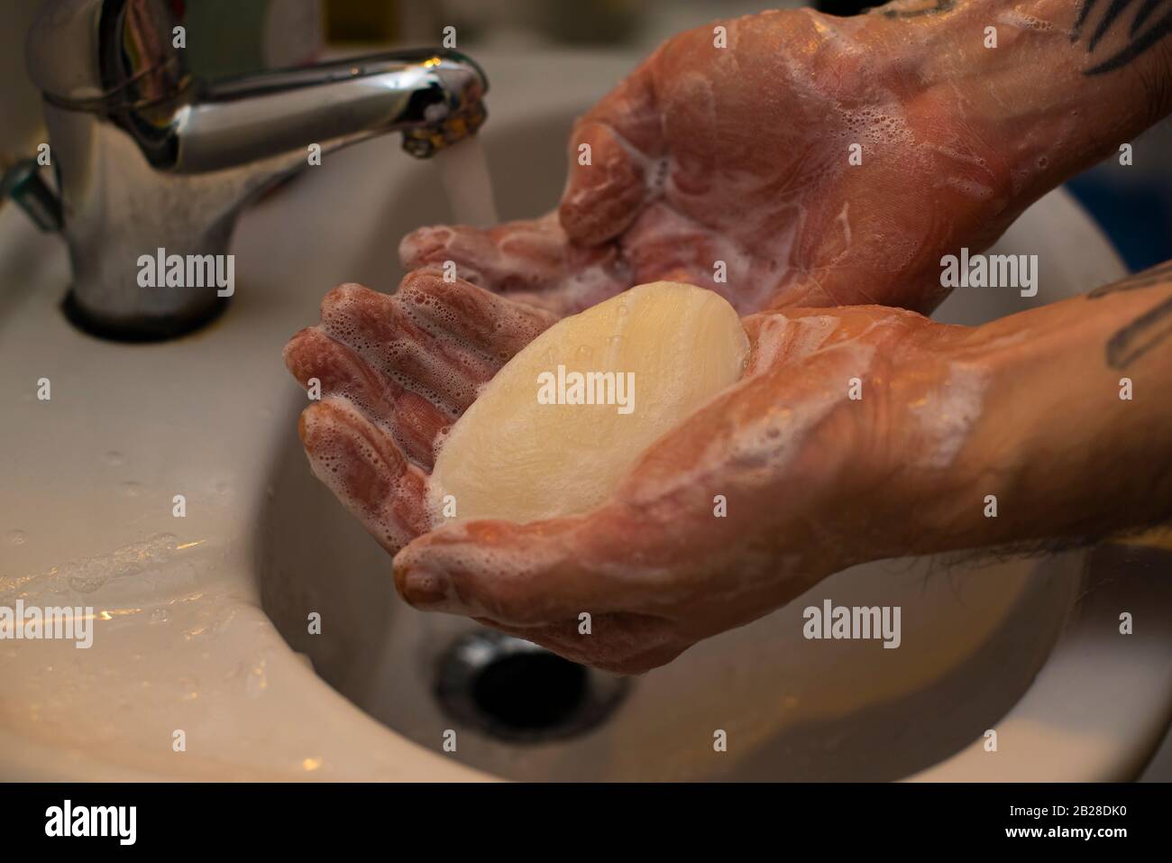 Wash hands with soap, wash hands under running water with soap Stock ...