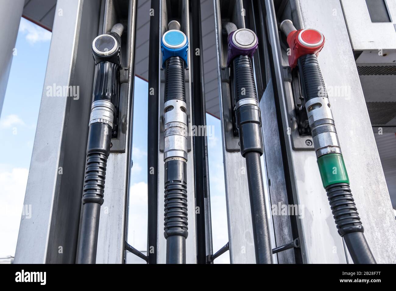 Gas and petrol station. Guns for refueling at a gas station. Detail of