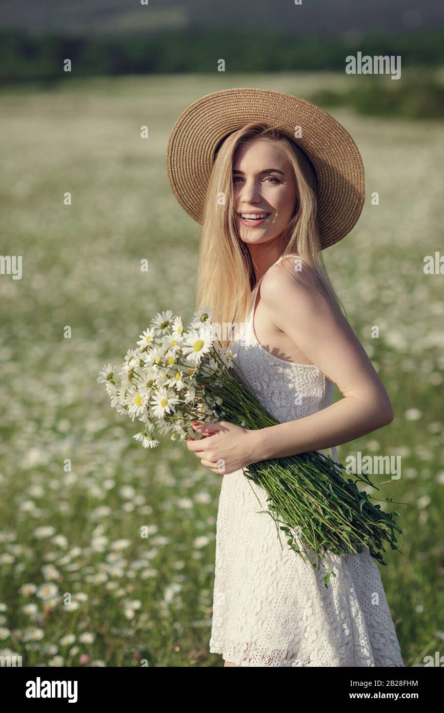 Beautiful Woman Enjoying Daisy Field Nice Female Lying Down In Meadow