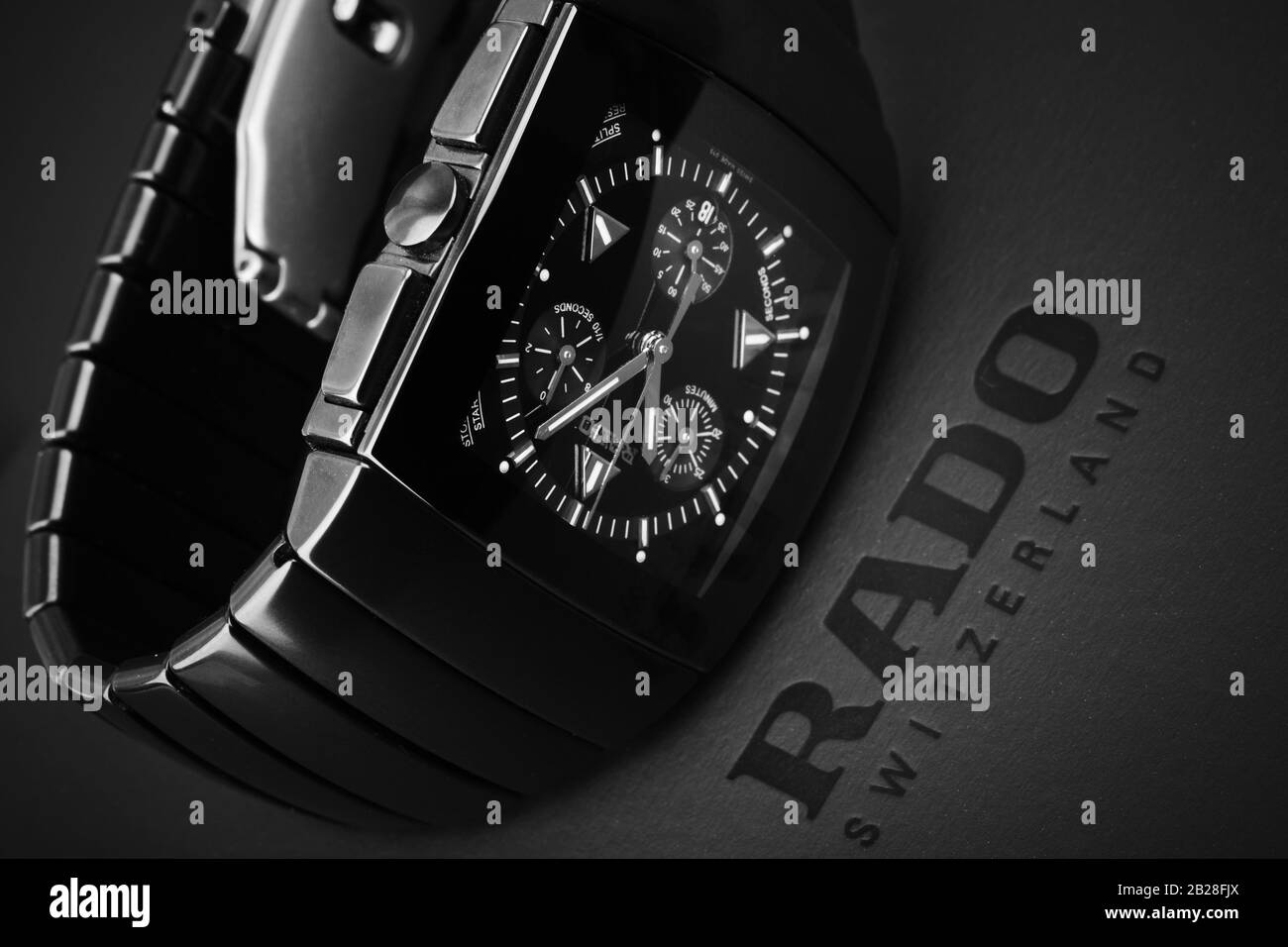 St.Petersburg, Russia - June 18, 2015: Rado Sintra Chrono, luxury mens  chronograph watch made of high-tech ceramics with sapphire glass lay over  black Stock Photo - Alamy