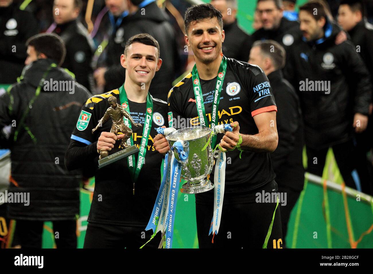 Goal scorer Rodri of Manchester City (R) and man of the match Phil Foden of Manchester City (L) pose with the Carabao Cup Trophy after winning the cup. Carabao Cup 2020 final match, Aston Villa v Manchester city at Wembley Stadium in London on Sunday 1st March 2020. this image may only be used for Editorial purposes. Editorial use only, license required for commercial use. No use in betting, games or a single club/league/player publications . pic by Steffan Bowen/Andrew Orchard sports photography/Alamy Live news Stock Photo