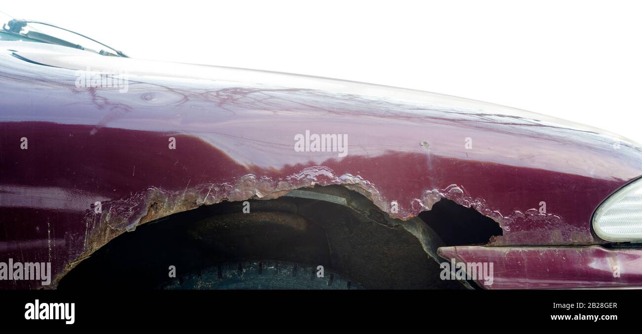 old and rusty car fender isolated on white, auto repair concept Stock