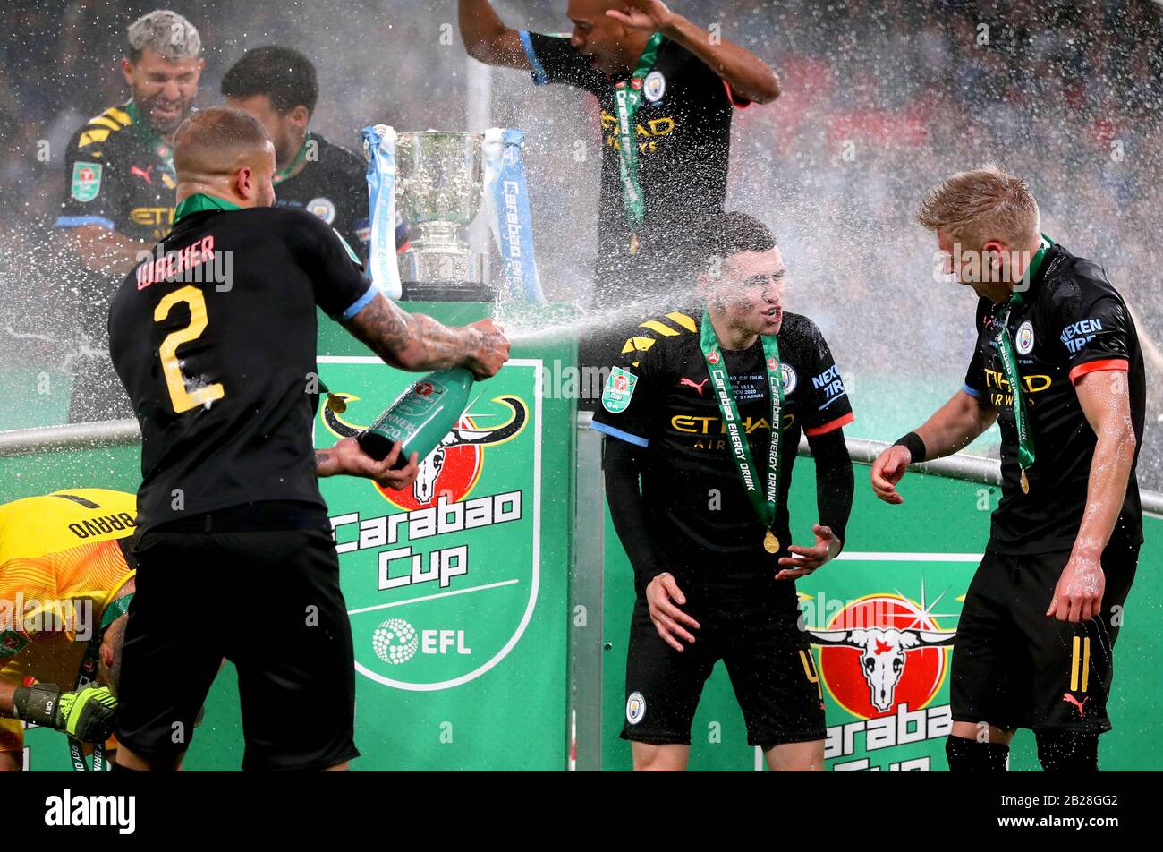 Manchester City's Kyle Walker (left) sprays team mates Alexander