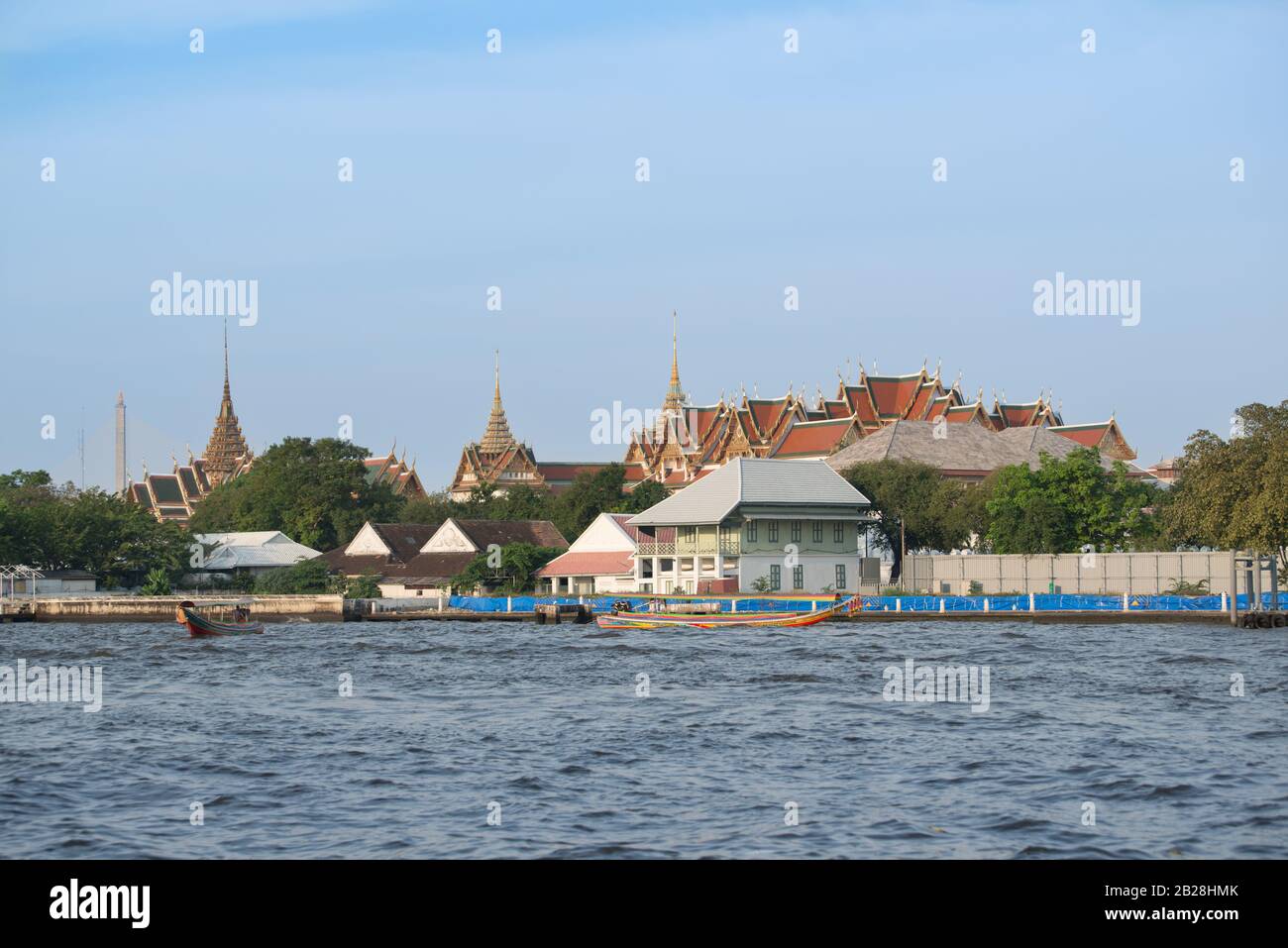 View over river Chao Phraya to Grand palace in Bangkok, Thailand. Stock Photo
