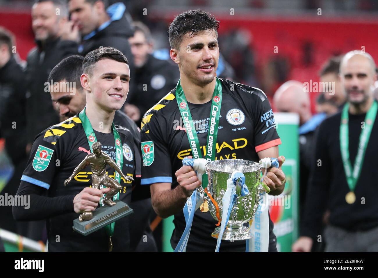 London, UK. 1st March 2020. Phil Foden (47) of Manchester City (left) and Rodrigo (16) of Manchester City celebrate victory during the Carabao Cup Final between Aston Villa and Manchester City at Wembley Stadium, London on Sunday 1st March 2020. (Credit: Jon Bromley | MI News) Photograph may only be used for newspaper and/or magazine editorial purposes, license required for commercial use Credit: MI News & Sport /Alamy Live News Stock Photo