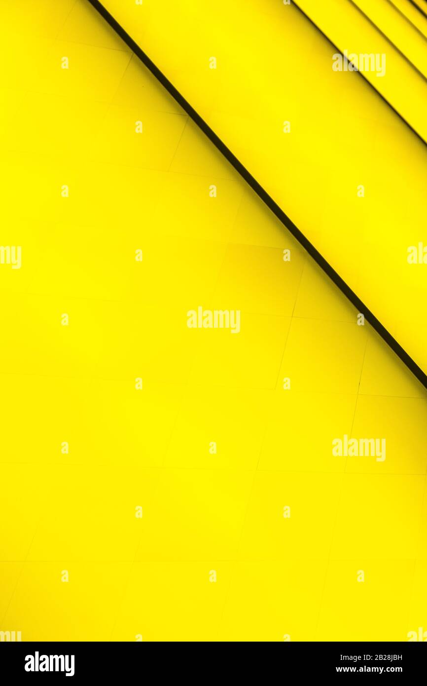Yellow abstract background with dark diagonal lines. Fondation Louis Vuitton,  Paris, France, July 2019. Beautiful design, colorful vertical shot Stock  Photo - Alamy
