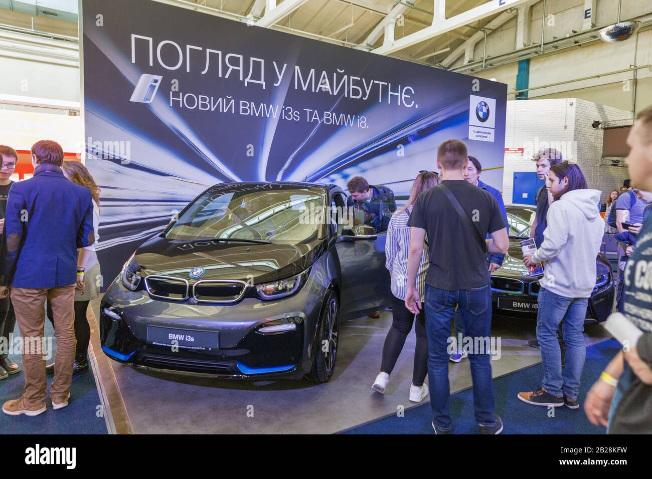 KYIV UKRAINE APRIL 06 2019 People visitb BMW electric cars