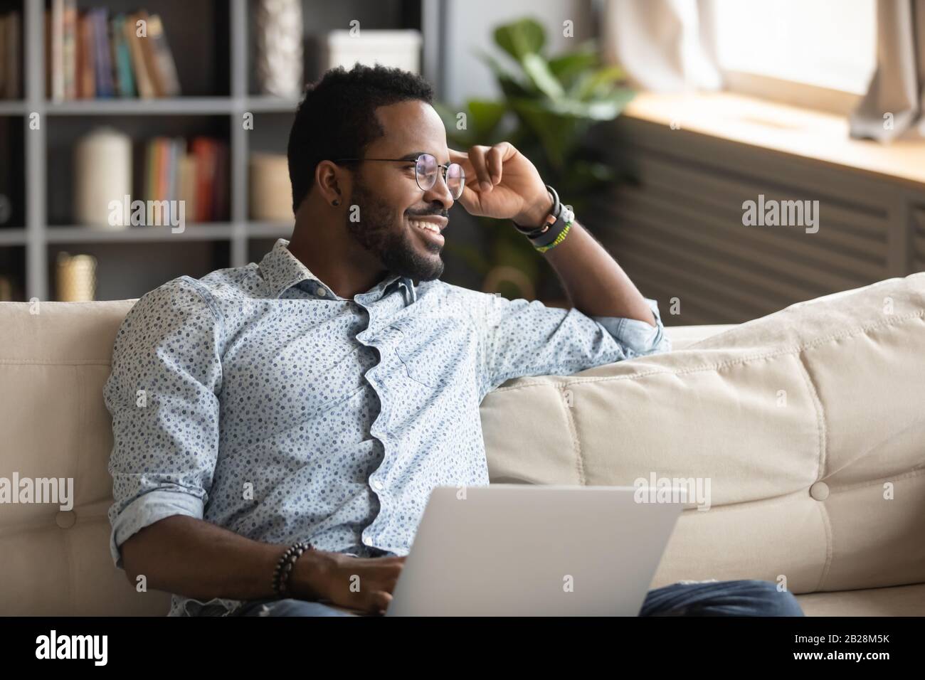 Dreamy black guy thinking hi-res stock photography and images - Alamy