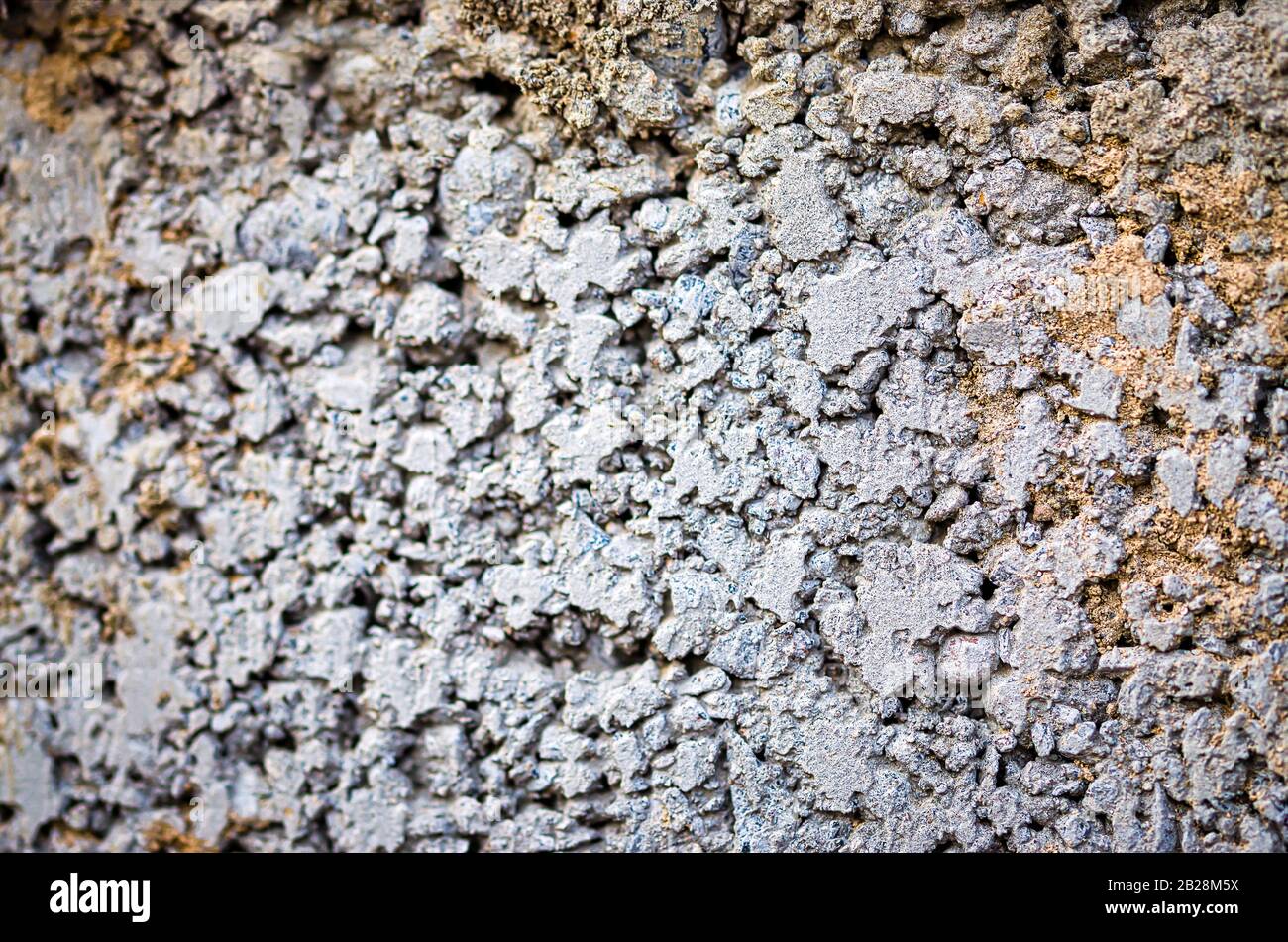 Crude Concrete Grunge Background with varying focus. Stock Photo