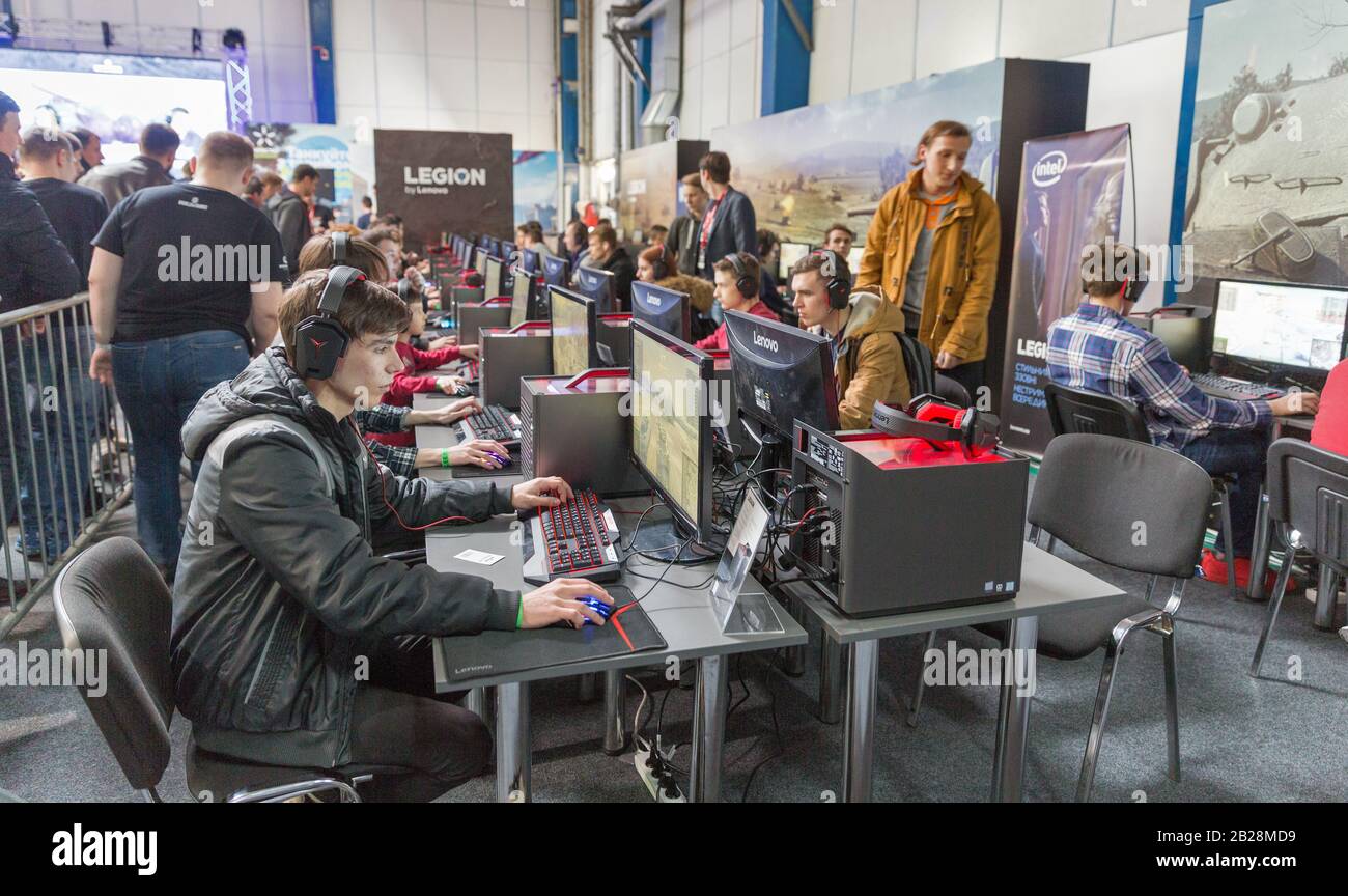 KYIV, UKRAINE - APRIL 13, 2019: Gamers participate in World of Tanks tournament in game zone during CEE 2019, the largest consumer electronics trade s Stock Photo