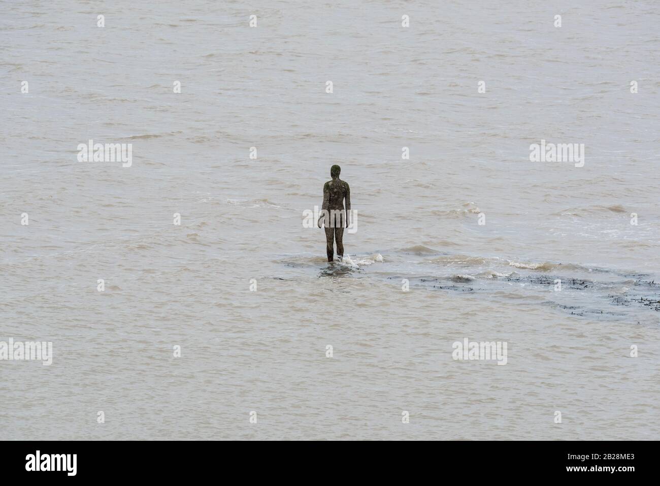 Anthony Gormley statue in the sea at Margate, Kent Stock Photo Alamy