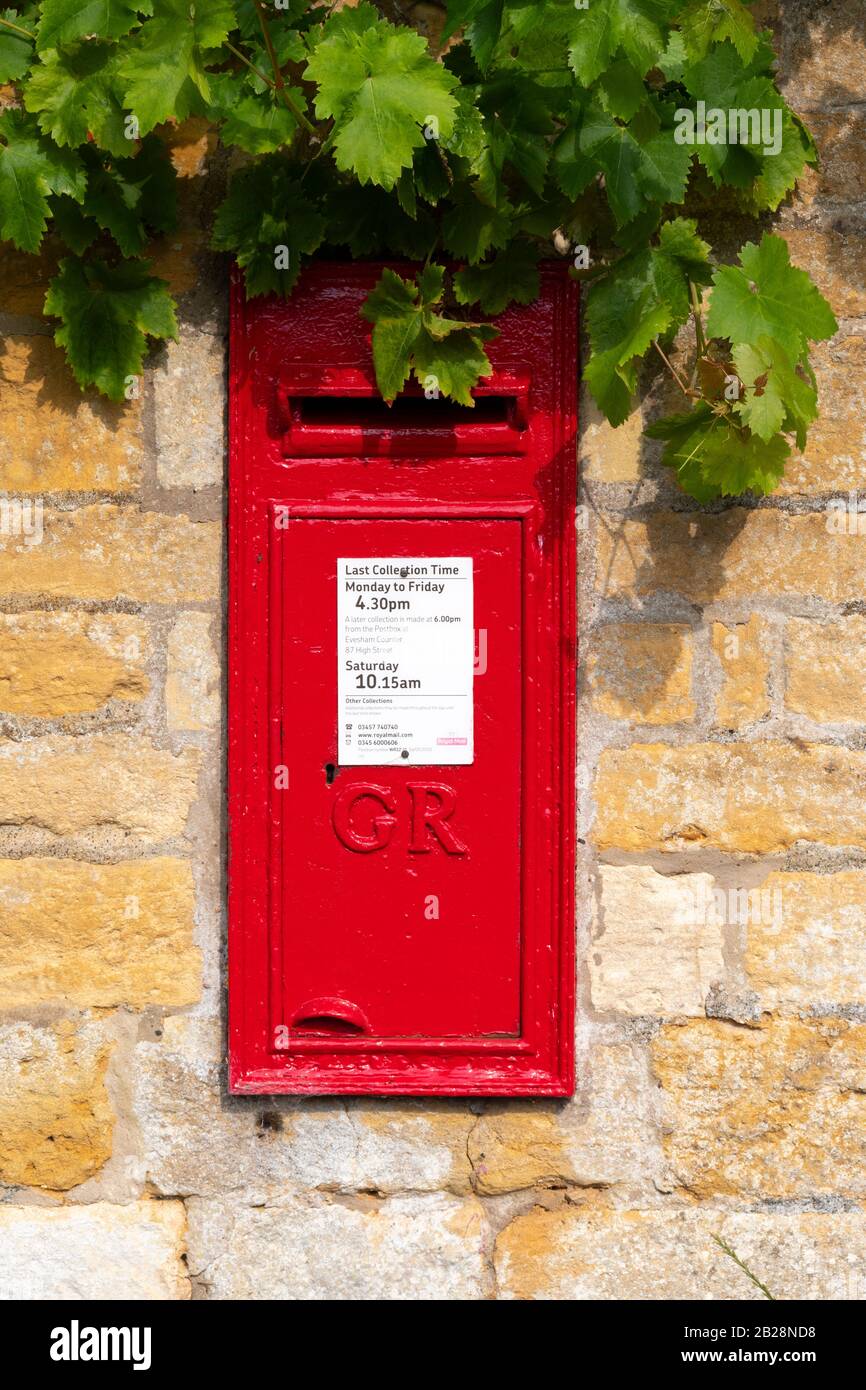 Post box in stone wall, Snowshill, Gloucestershire, Cotswolds, England Stock Photo
