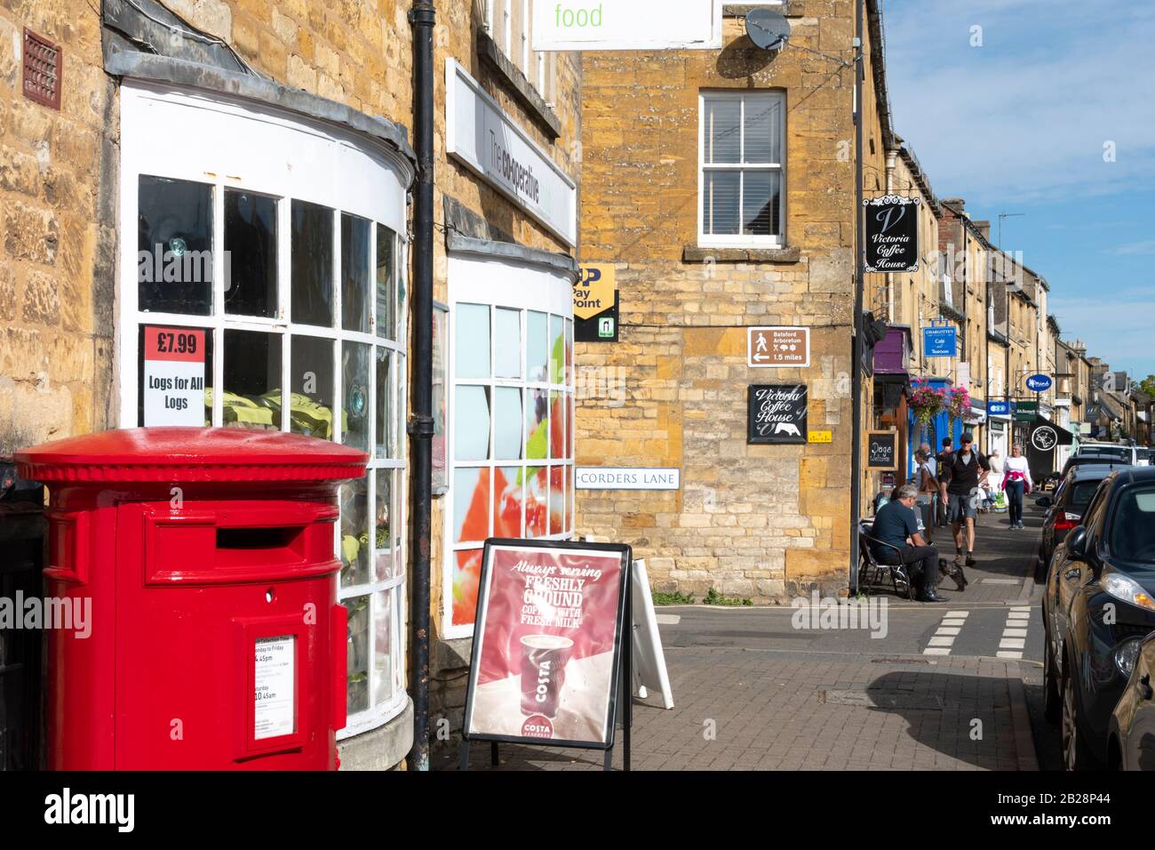 Shops and mail box in High Street, Moreton in the Marsh, Cotswolds, Gloucestershire, England Stock Photo