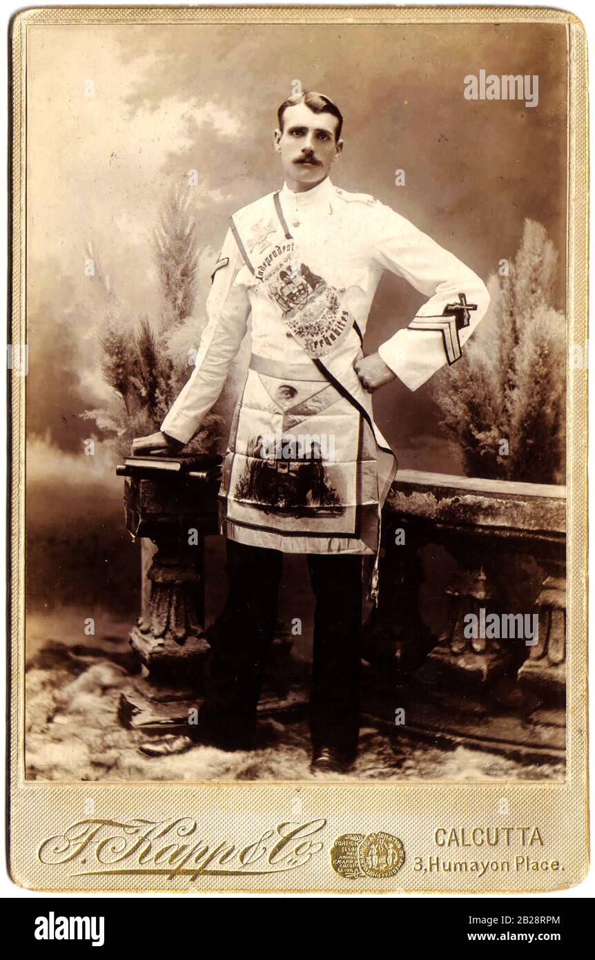 ORDERS & FRIENDLY SOCIETIES - An Indian Carte de Visite showing and English member of the Order of Rechabites (Temperance Orderin full regalia. Photographer is Fritz Kapp & Company, 3 Humayon Place,  Calcutta ( modern day Kolkata). The studios were active in Calcutta from 1896-1903. The man is wearing the insignia of  rifleman  and good conduct stripes from WWI. Stock Photo