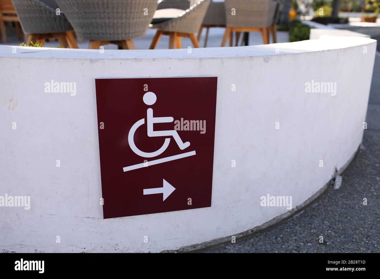 disabled people wheelchair ramp icon sign on the pier near cafe Stock ...