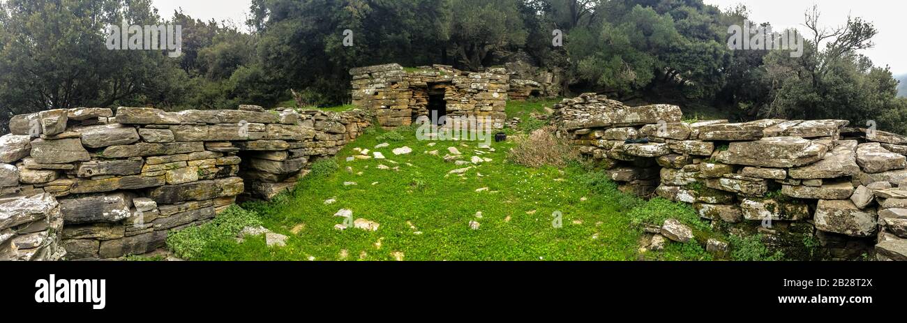 Dragon house at Euboea island, Greece. Dragon houses are old houses, built of massive stone blocks  without mortar and large stone slabs for the roof. Stock Photo
