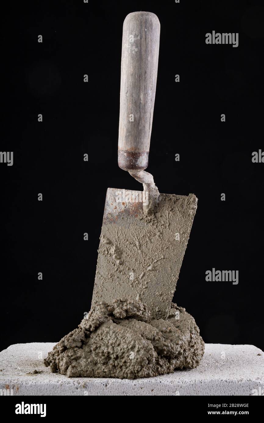 Trowel and mortar prepared for masonry. Accessories for building houses