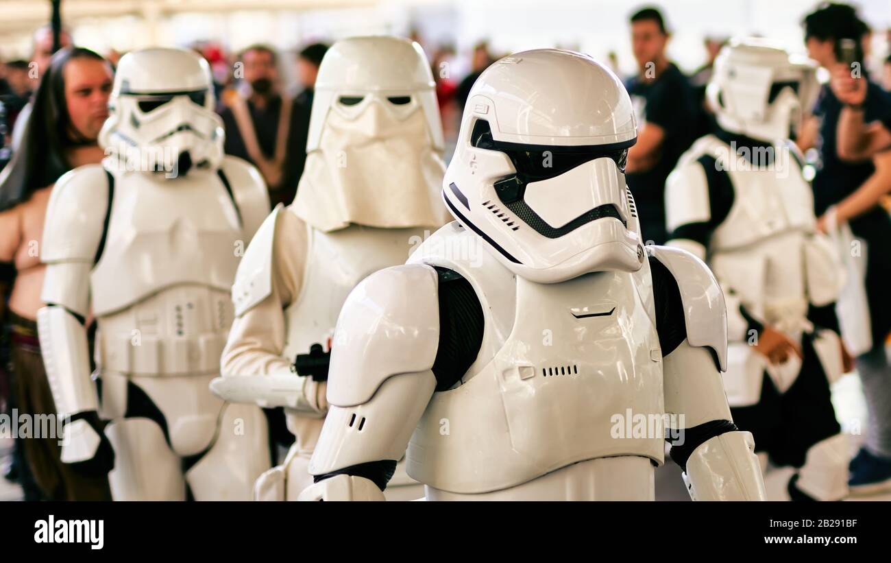 Star Wars White Imperial Stormtroopers procession at ROMICS Festival (Rome Comics), twice a year the iconic gathering of cosplay, science fiction fans Stock Photo