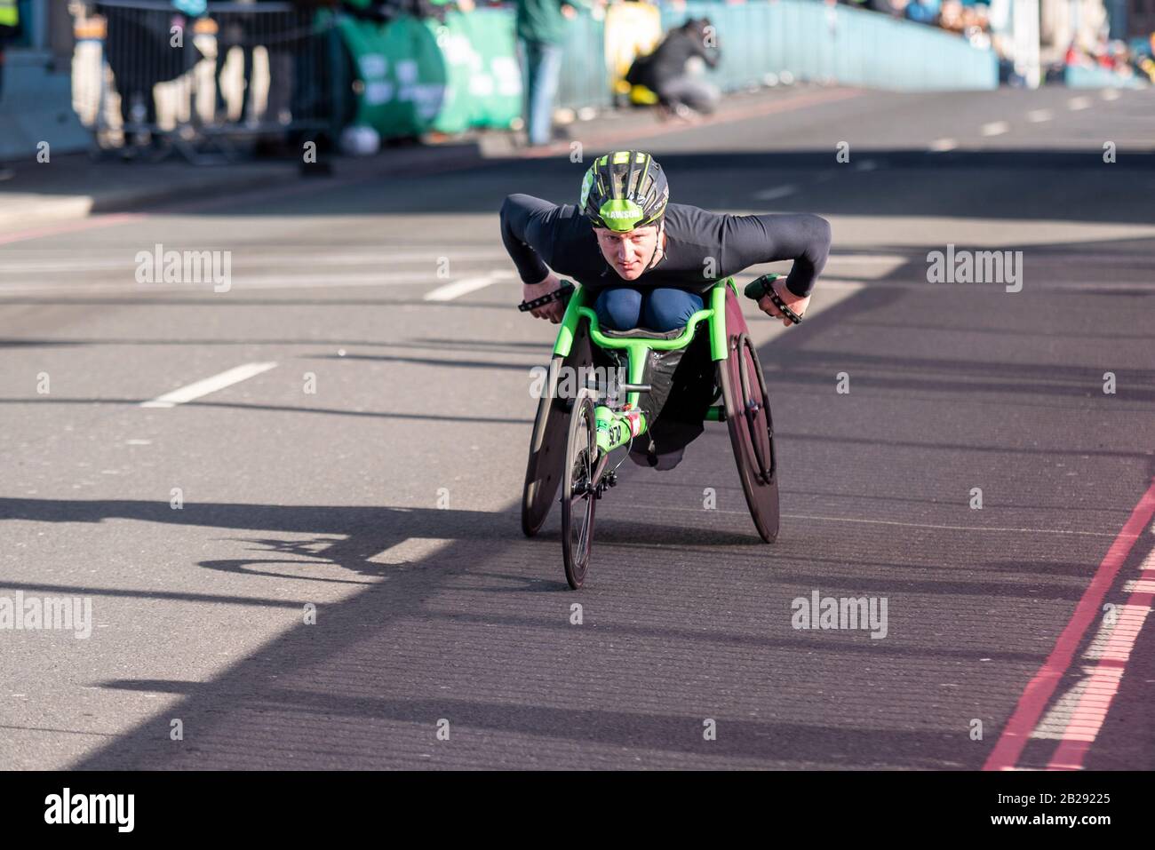 Simon Lawson racing in the Vitality Big Half half marathon crossing Tower Bridge, London, UK. Stock Photo