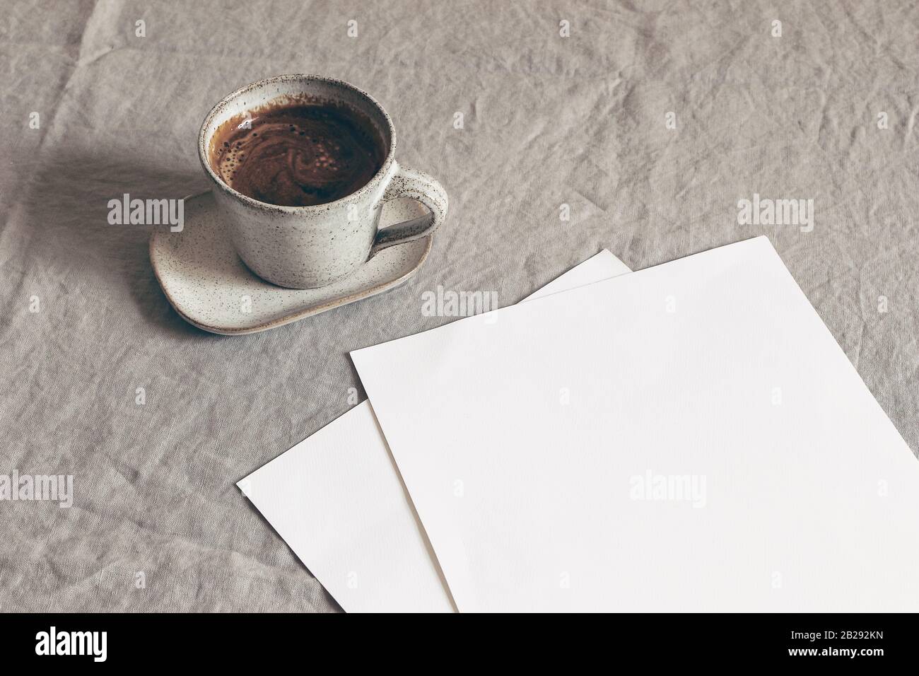Download Cup Of Coffee And Blank Sheets Of Paper Moody Breakfast Table Stationery Mockup Scene Beige Linen Tablecloth Background Sparse Still Life Stock Photo Alamy PSD Mockup Templates