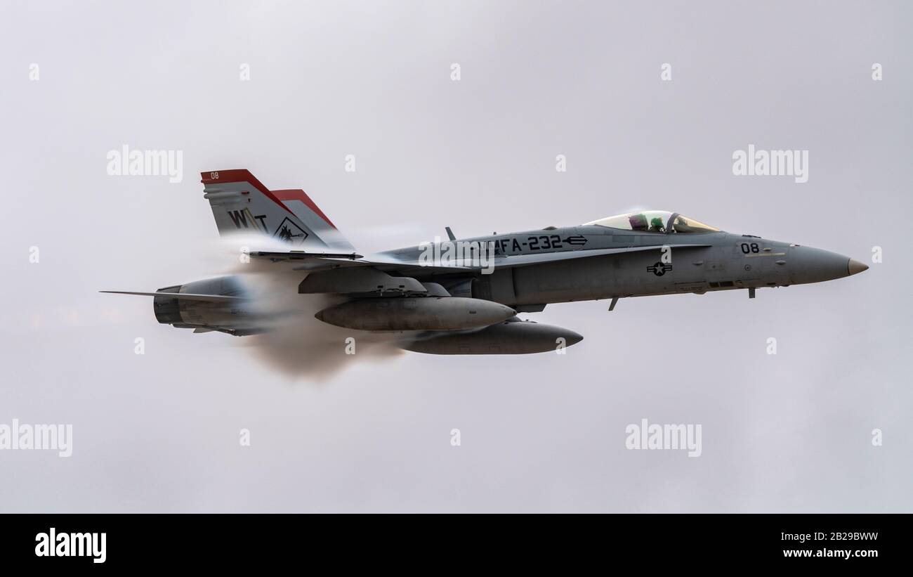 Military jet fighter flying at airshow Stock Photo - Alamy