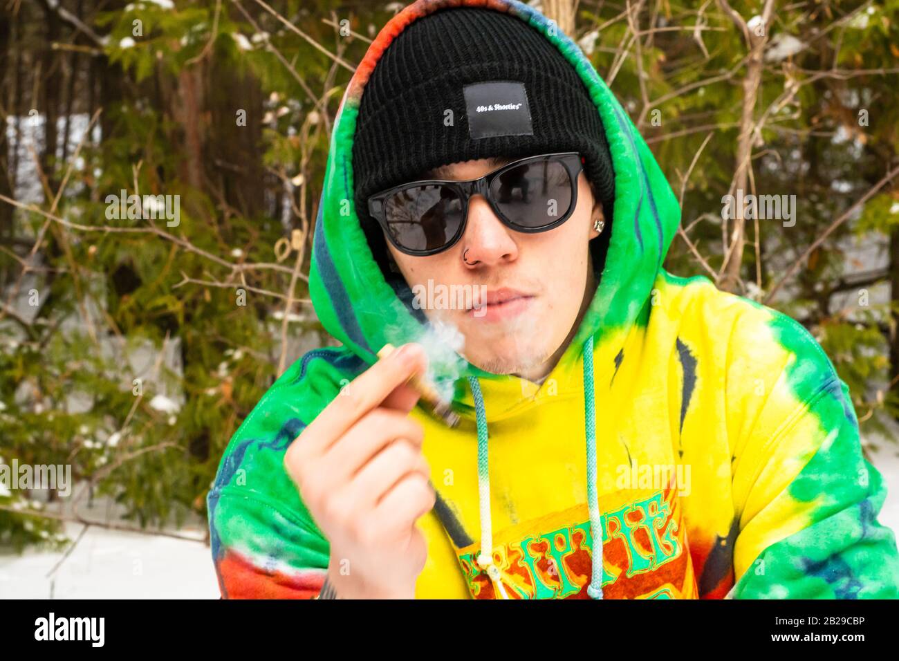 Male model modeling hoody and shirt Stock Photo