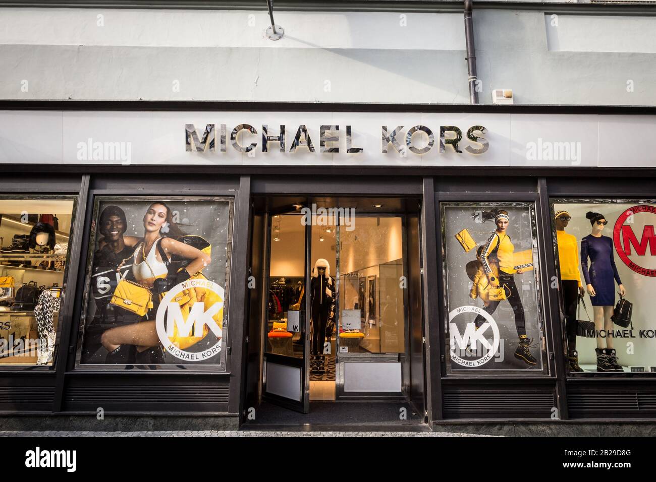 PRAGUE, CZECHIA - NOVEMBER 1, 2019: Michael Kors logo in front of their boutique for Prague. Michael Kors is an American luxury fashion designer & man Stock Photo