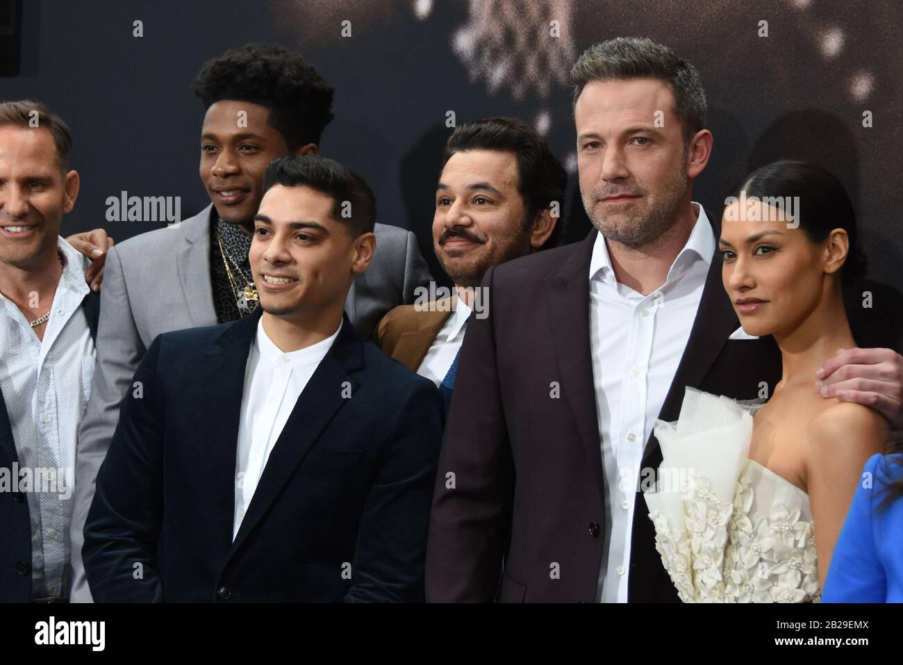 Los Angeles, California, USA 1st March 2020 (L-R) Actor Chris Bruno, actor Melvin Gregg, actor Fernando Luis Vega, actor Al Madrigal, actor Ben Affleck, and actress Janina Gavankar attend Warner Bros. Pictures 'The Way Back' World Premiere on March 1, 2020 at Regal LA Live in Los Angeles, California, USA. Photo by Barry King/Alamy Live News Stock Photo
