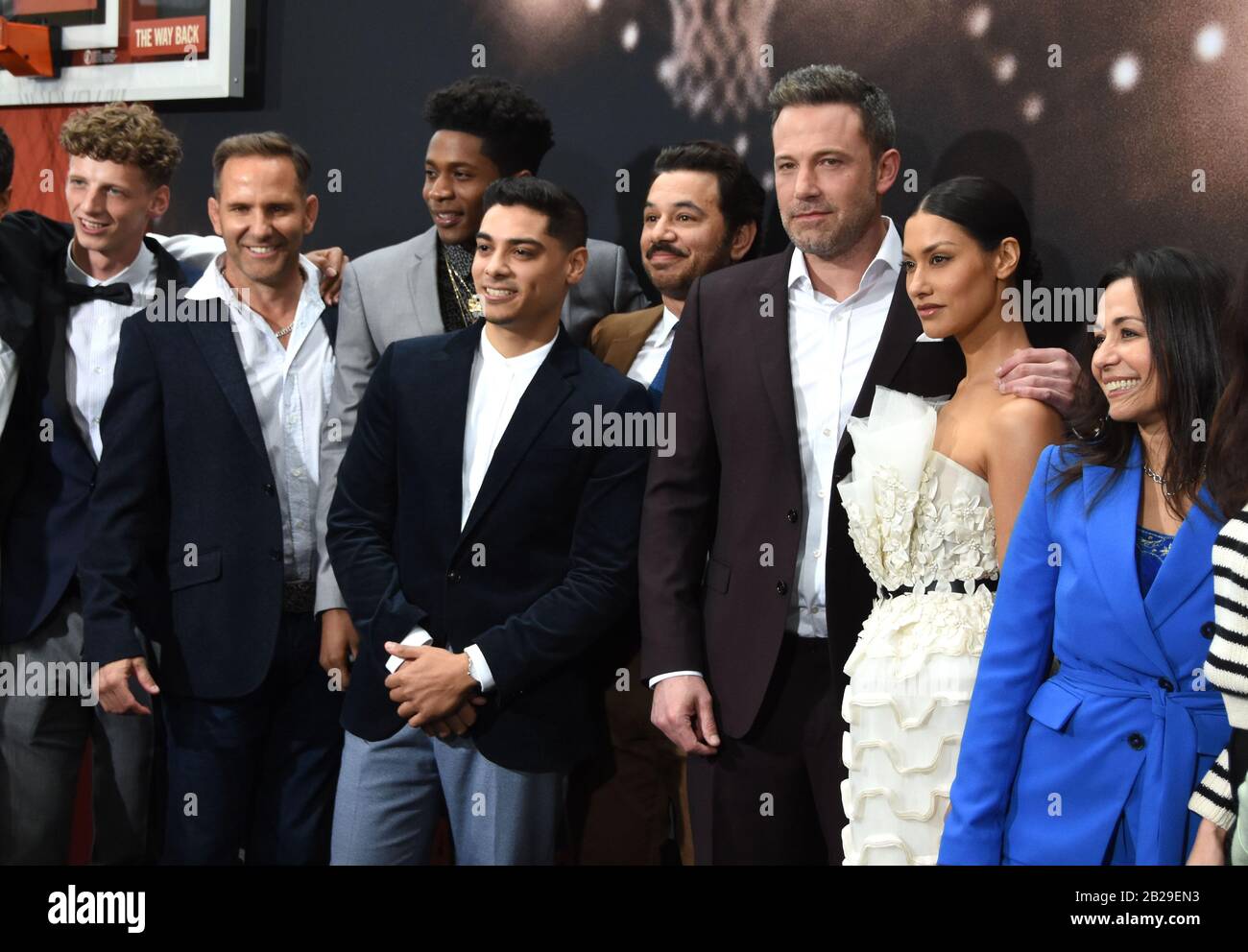 Los Angeles, California, USA 1st March 2020 (L-R) Actor Tyler O'Malley, actor Chris Bruno, actor Melvin Gregg, actor Fernando Luis Vega, actor Al Madrigal, actor Ben Affleck, and actress Janina Gavankar attend Warner Bros. Pictures 'The Way Back' World Premiere on March 1, 2020 at Regal LA Live in Los Angeles, California, USA. Photo by Barry King/Alamy Live News Stock Photo