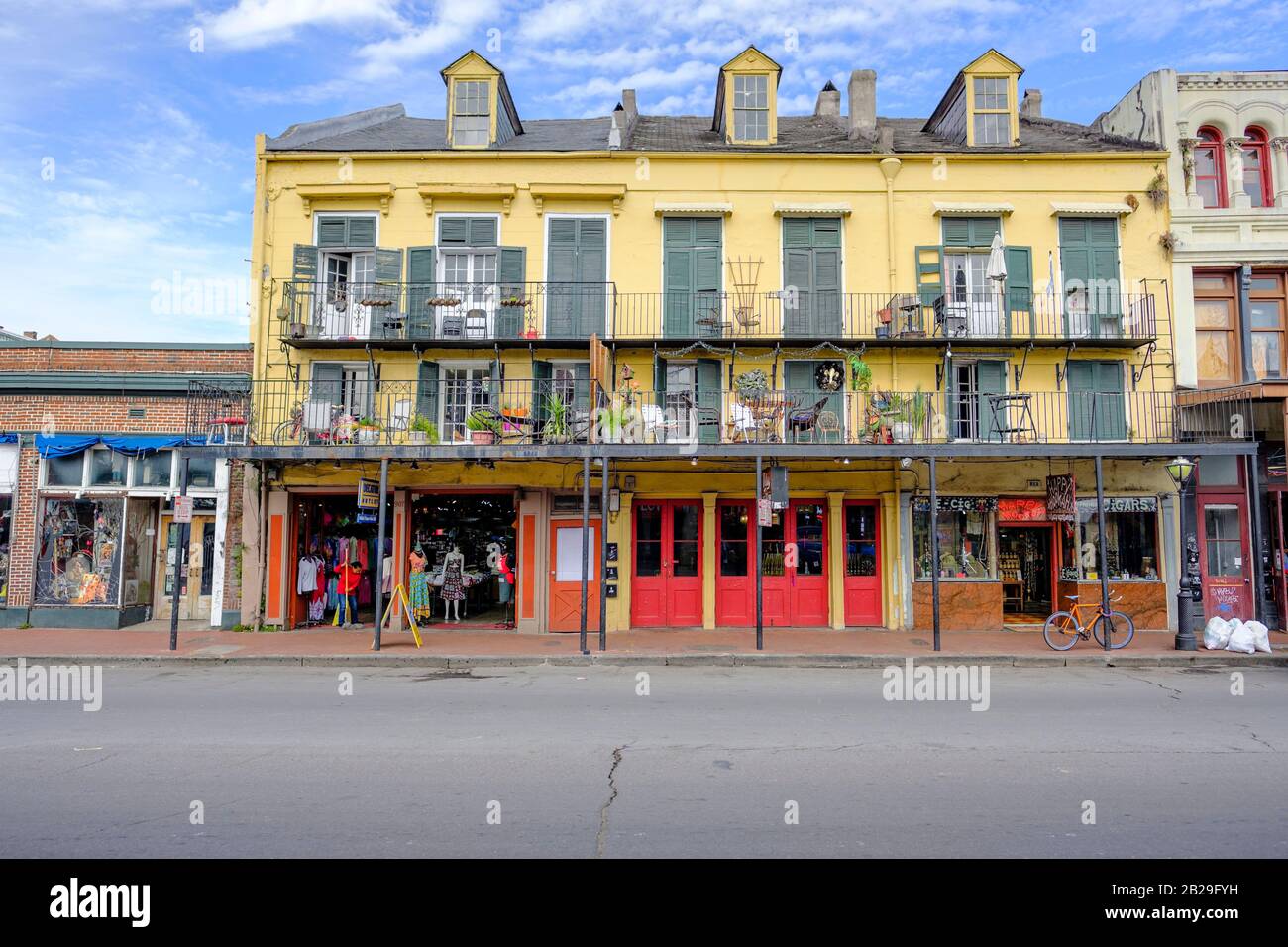 Typical architecture, retail, commercial, store buildings on Decatur Street, New Orleans French Quarter New Orleans, Louisiana, USA Stock Photo