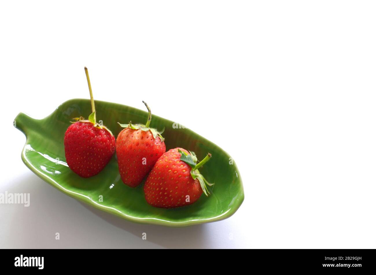 Strawberry sliced in half hi-res stock photography and images - Alamy