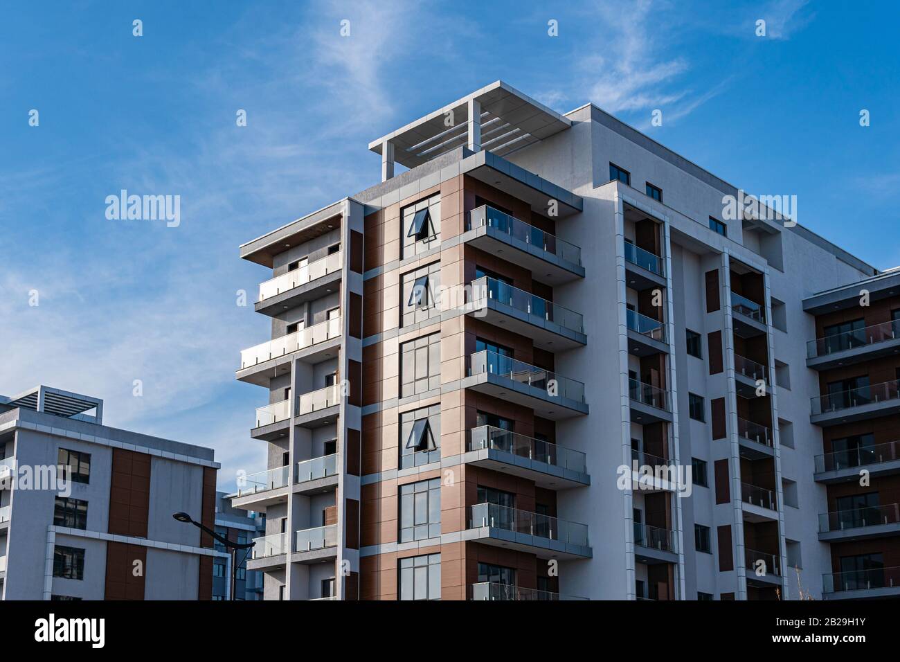 Modern apartments building at finishing stage. Modern architecture house Stock Photo