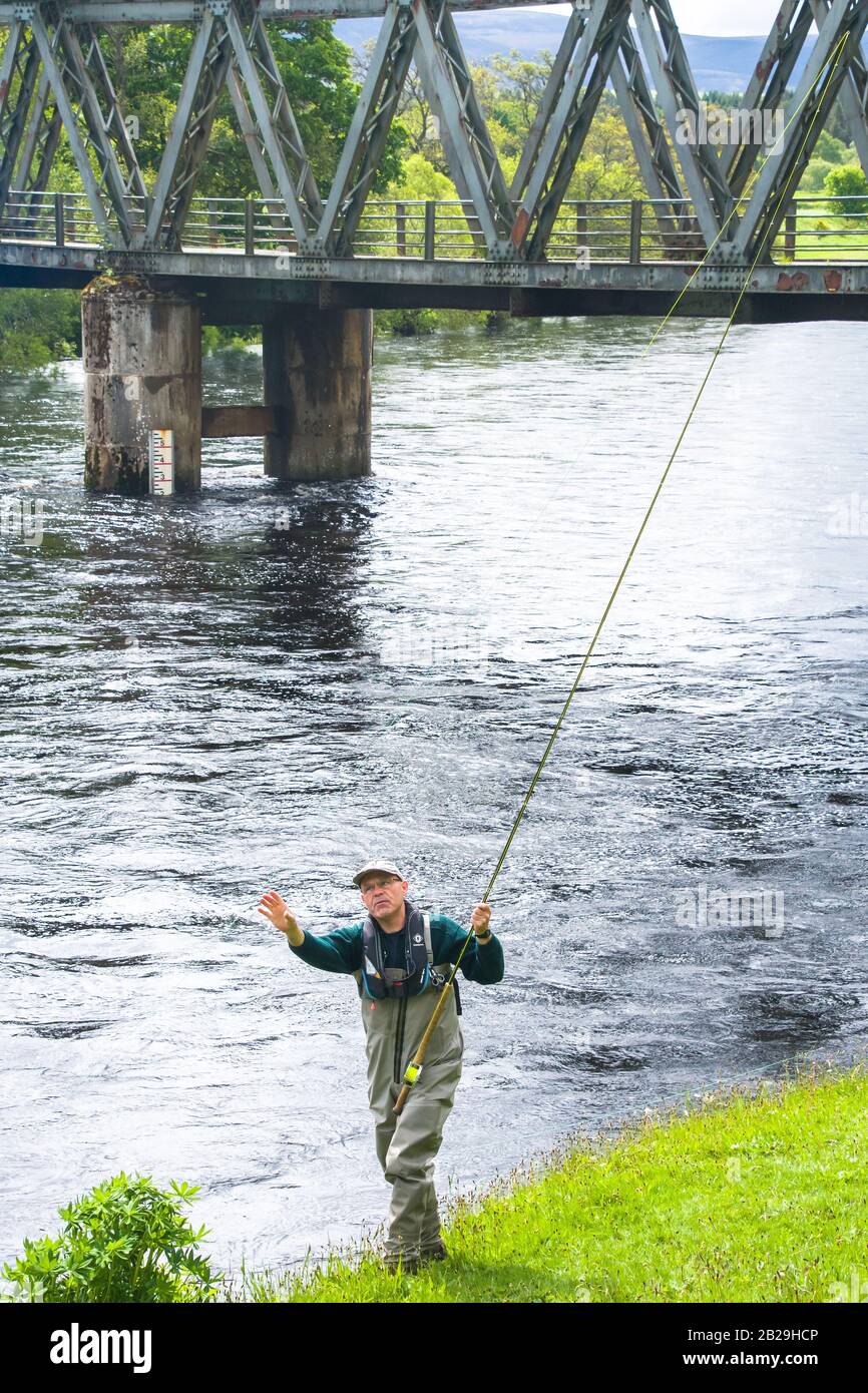 Grantown on Spey, Highlands, Scotland Salmon fishermen on the banks of the Spey River Stock Photo
