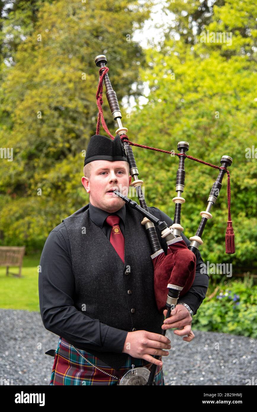 Bagpipe serenade in the Highlands of Scotland Stock Photo