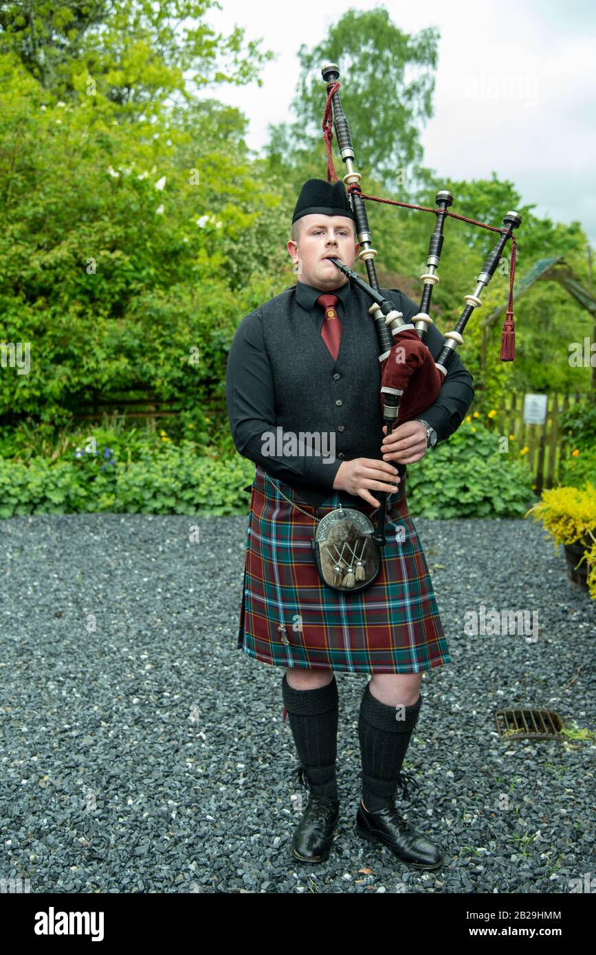 Bagpipe serenade in the Highlands of Scotland Stock Photo