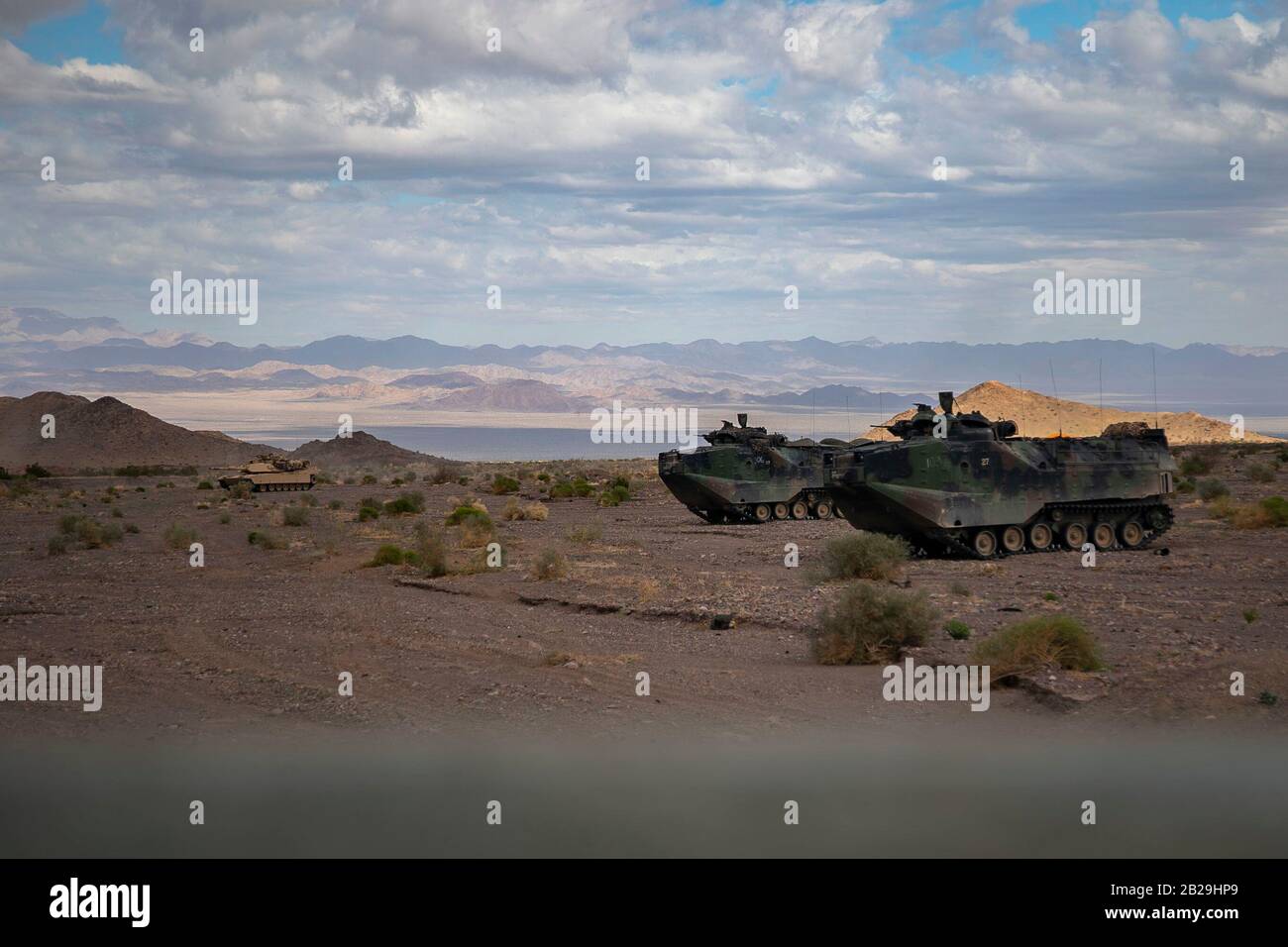 U.S. Marine Corps vehicles attached to various units, stand by during a Regimental Assault Course (RAC), Marine Air Ground Combat Center, Twentynine Palms, California, Feb. 11, 2020. Marines with 1st Battalion, 3rd Marine Regiment participating in integrated training exercise (ITX) 2-20, conducted a Marine Corps Combat Readiness Evaluation (MCREE), along with various other training events to prepare Marines for deployment. (U.S. Marine Corps photo by Lance Cpl. Jose Angeles) Stock Photo