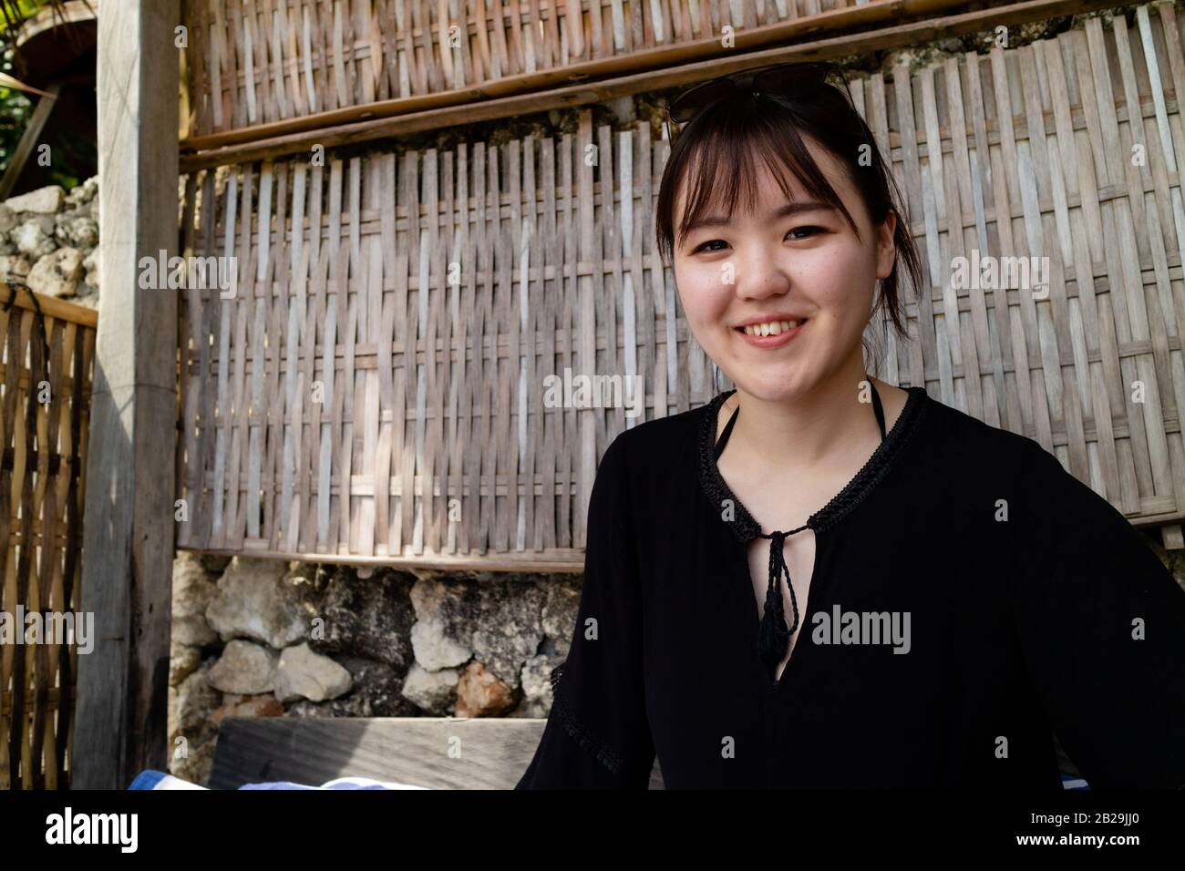 A beautiful woman smiling at the camera Stock Photo