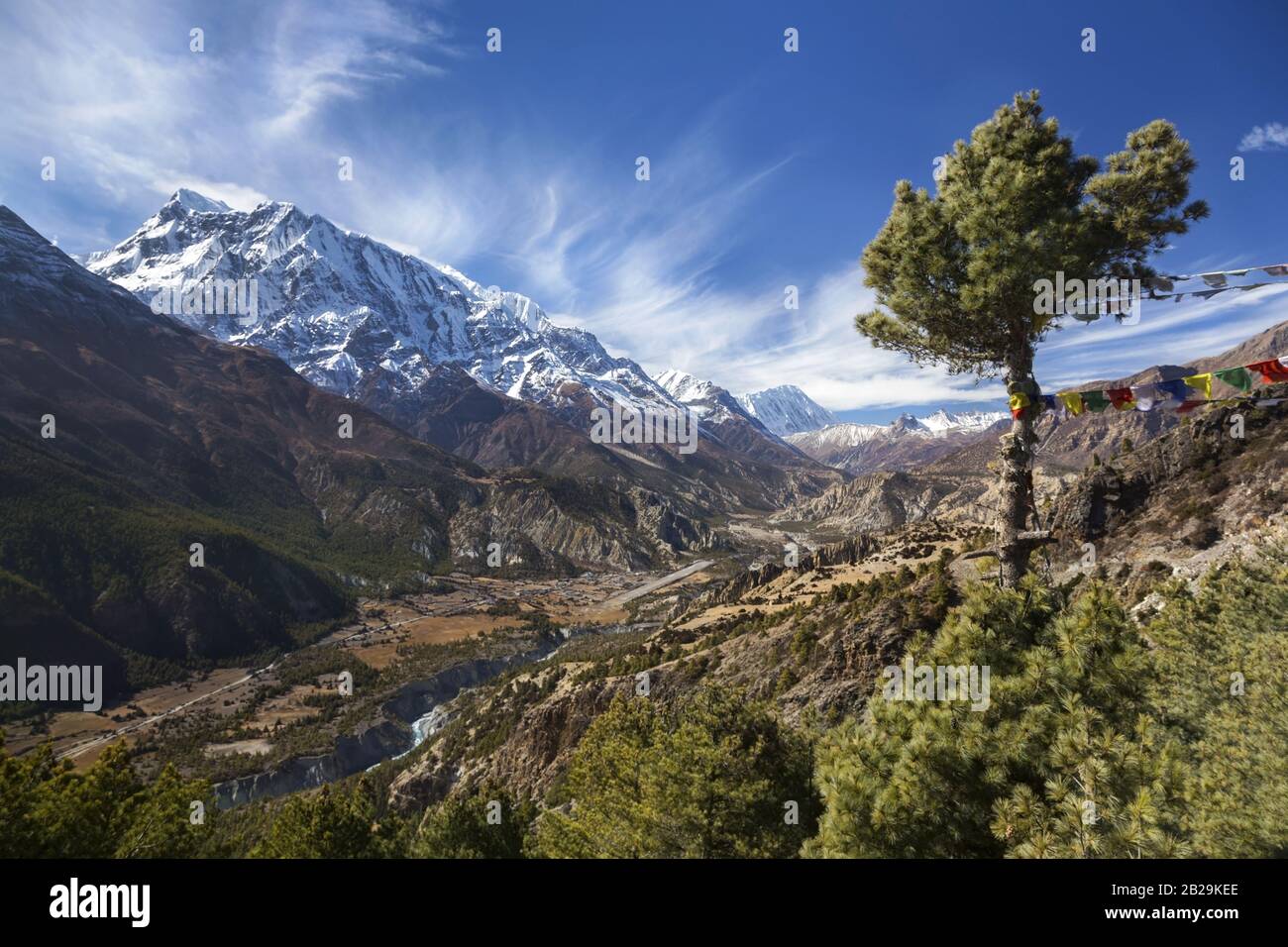 Annapurna Mountain Peak Range Landscape View from trekking route between Pisang and Manang Villages in Nepal Himalaya Mountains Stock Photo