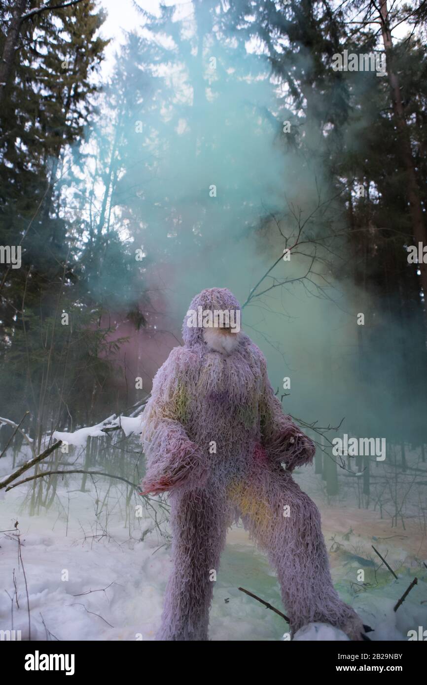 Yeti fairy tale character in winter forest. Outdoor fantasy photo. Stock Photo