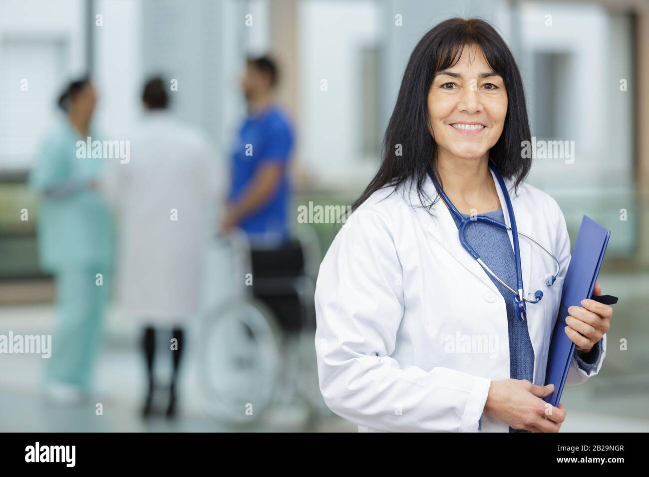 Middle aged asian male doctor hi-res stock photography and images - Alamy