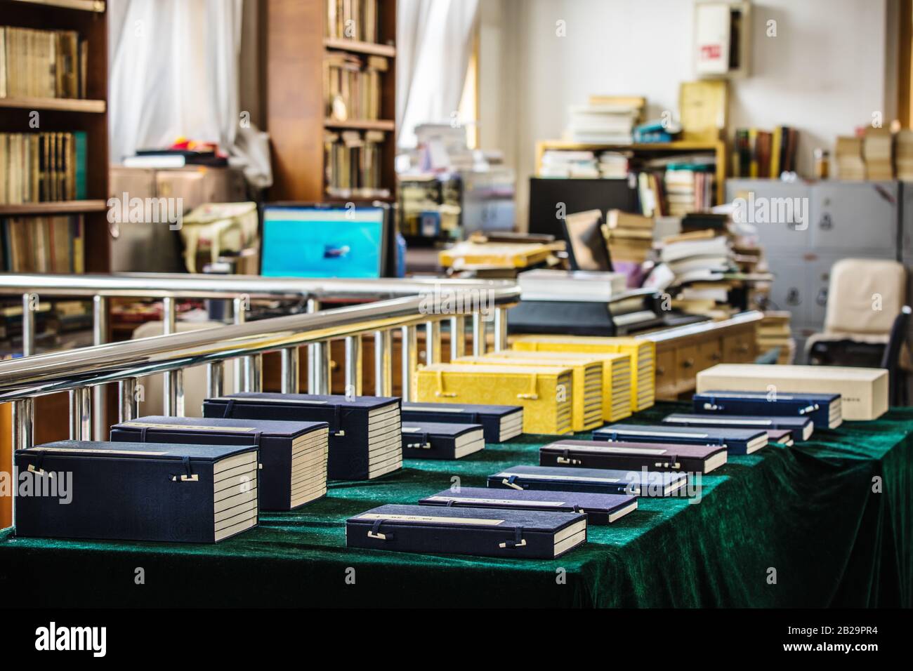 BEIJING, СHINA JUNE 01, 2019 Traditional Chinese library with shelves of old and modern books