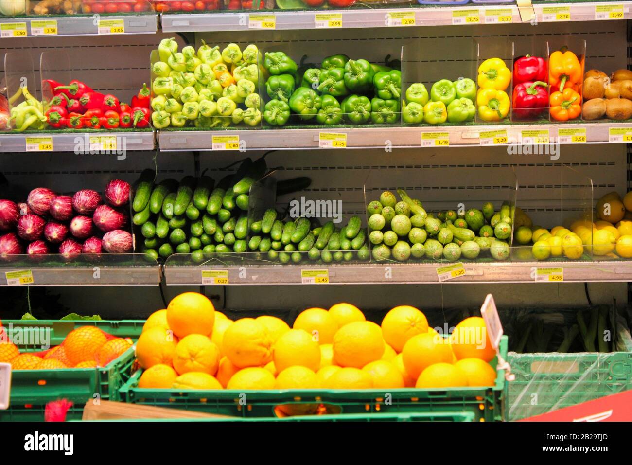 Shelves with fruits and vegetables at supermarket in Athens, Greece
