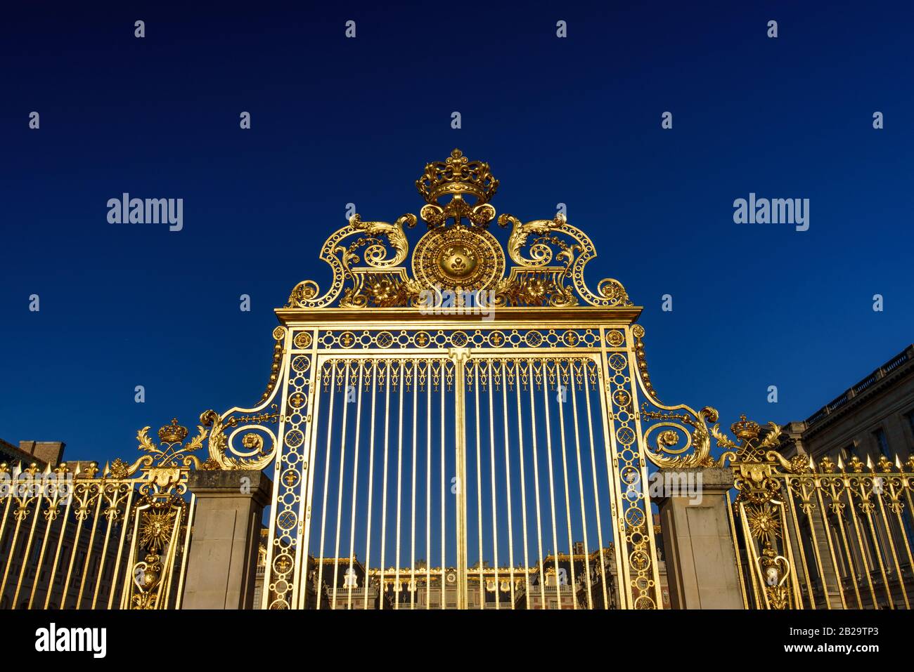 The golden gate of Palace of Versailles (Château de Versailles), Paris, France Stock Photo