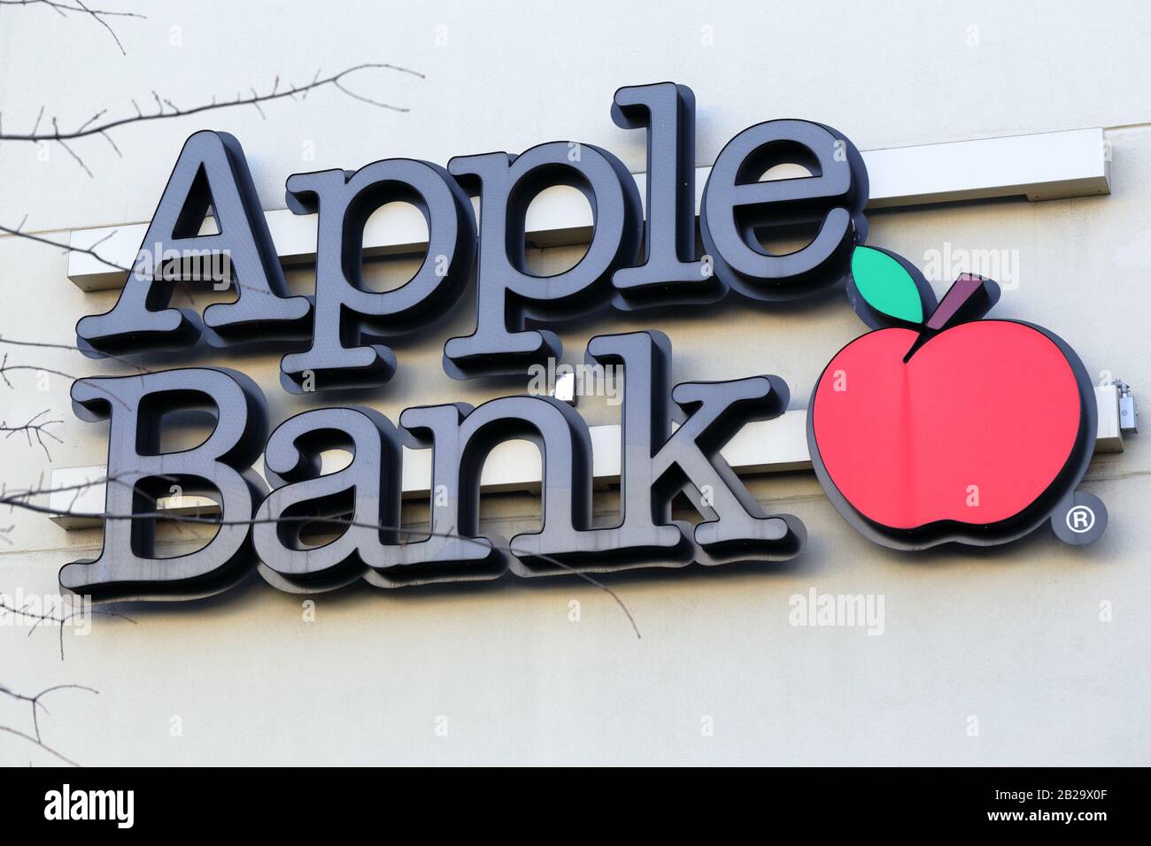 An Apple Bank for Savings logo at one of their bank branches in New York, NY Stock Photo