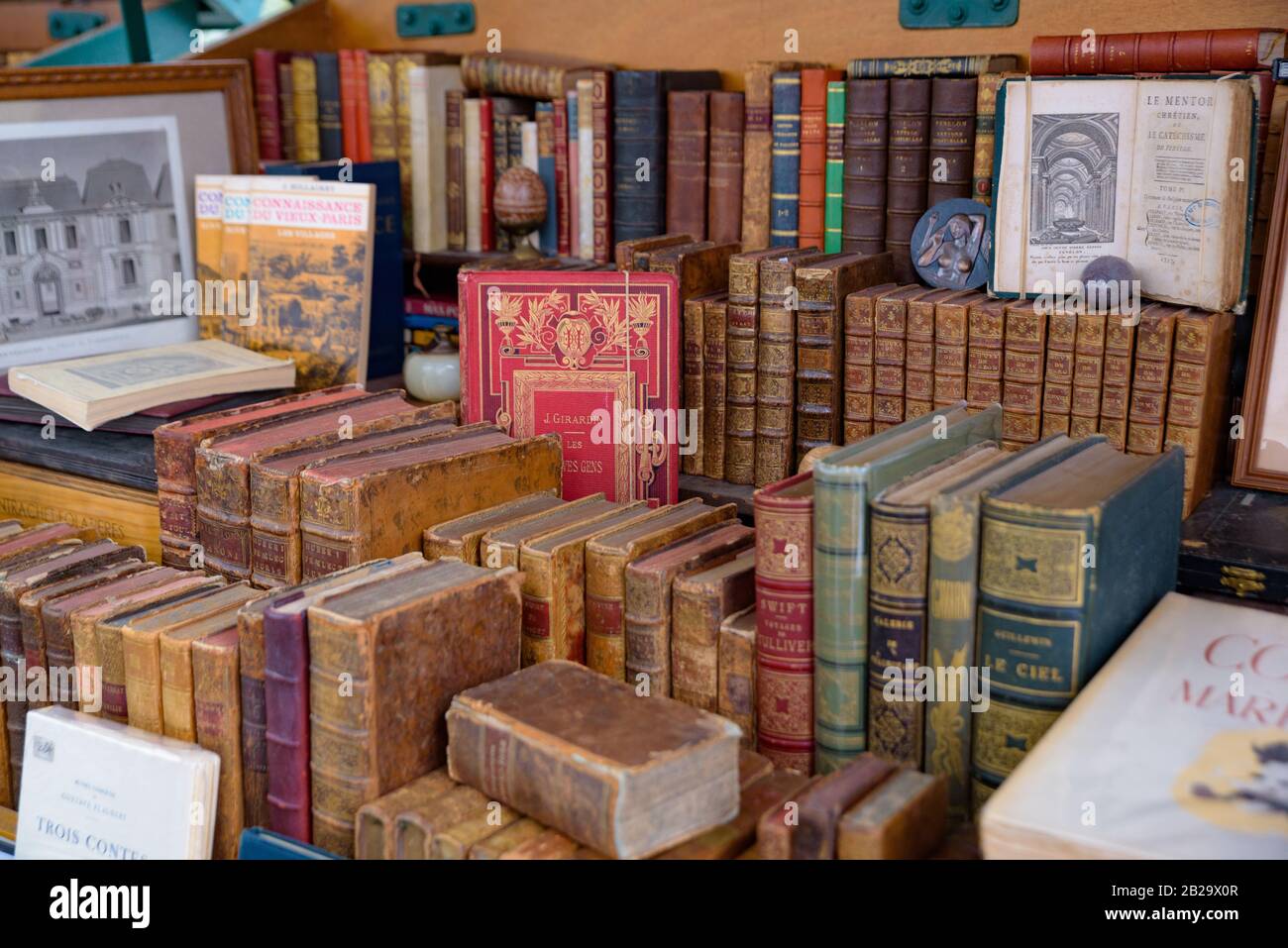 Second hand vintage books on shelves Stock Photo