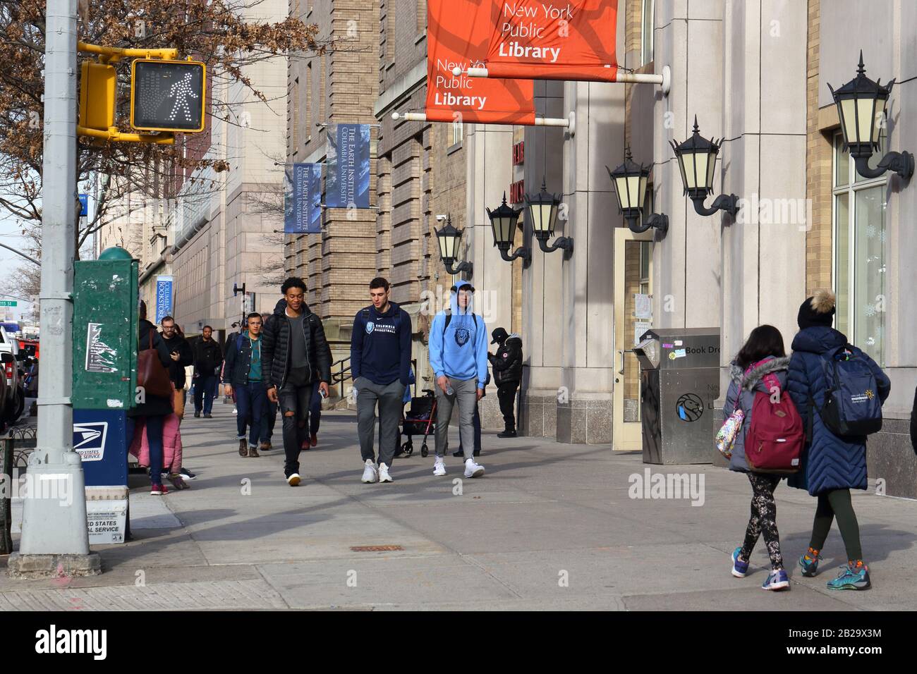 People, students walking down Broadway in Morningside Heights near Columbia University in New York, NY. February 24, 2020 Stock Photo