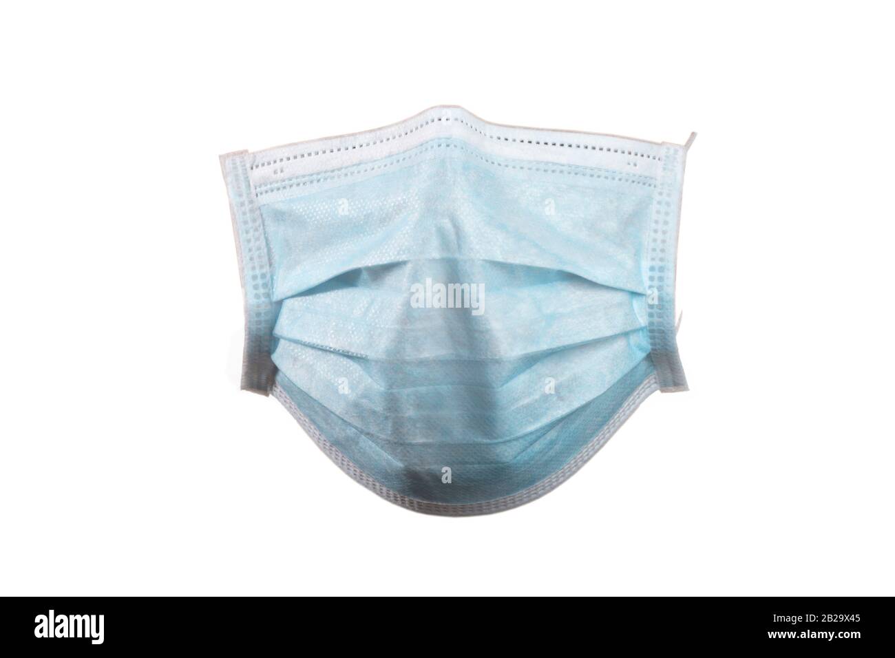 blue disposable surgical face masks with front face shape Stock Photo