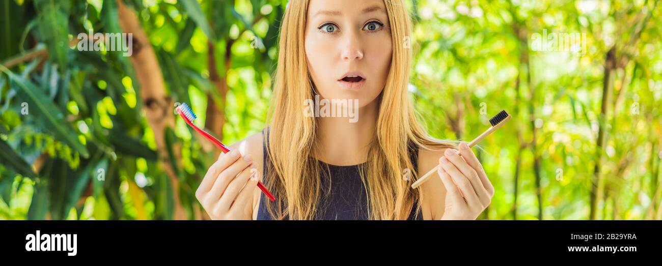 Banner Long Format Woman Holds Eco Natural Bamboo Toothbrush And In Other Hand Plastic Toothbrush Rustic Background Sustainable Lifestyle Concept Stock Photo Alamy